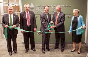 At the grand opening ceremony for the Lesley L. Walls Vision Center, from left to right: Dr. Steve Turner, President of Northeastern State University; Dr. Doug Penisten, Dean, Oklahoma College of Optometry; Richard Ogden, Chair of the Board of Regents of Oklahoma Colleges; Dr. Lesley Walls; and Dr. Mary Ann Walls.