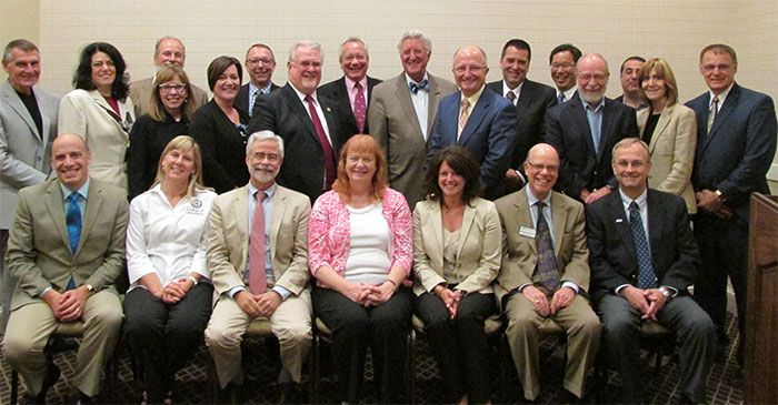 ASCO Executive Committee and Board of Directors: back row (left to right): Dr. Clifford Scott, President, New England College of Optometry; Dawn Mancuso, MAM, CAE, FASAE, ASCO Executive Director; Dr. Joseph A. Bonanno, Dean, Indiana University School of Optometry; Dr. Lori Grover, Dean, Salus University Pennsylvania College of Optometry; Dr. Kelly Nichols, Dean, University of Alabama at Birmingham School of Optometry; Dr. John Flanagan, Dean, University of California at Berkeley School of Optometry; Dr. Donald Jarnagin, Dean, Midwestern University Arizona College of Optometry; Dr. Douglas K. Penisten, Dean, Northeastern State University Oklahoma College of Optometry; Dr. Arol R. Augsburger, President, Illinois College of Optometry; Dr. Timothy Wingert, Dean, University of The Incarnate Word Rosenberg School of Optometry; Dr. Joseph Zinkovich, Dean, MCPHS University School of Optometry; Dr. Stanley Woo, Dean, Southern California College of Optometry at Marshall B. Ketchum University; Dr. Roger Boltz, Interim Dean, University of Houston College of Optometry; Dr. Lewis Reich, Interim President, Southern College of Optometry; Dr. Josephine Shallo-Hoffman (not an ASCO Board Member); Dr. Andres Pagan, Dean, Inter American University of Puerto Rico School of Optometry. Front row (left to right): Dr. David A. Damari, Dean, Michigan College of Optometry at Ferris State University (At-Large Member); Dr. Elizabeth Hoppe, (Secretary-Treasurer), Founding Dean, Western University of Health Sciences College of Optometry; Dr. David A. Heath, (President), President, State University of New York College of Optometry; Dr. Karla Zadnik, (President-Elect), Dean and Professor, The Ohio State University College of Optometry; Dr. Jennifer Coyle (Immediate Past-President), Dean, Pacific University College of Optometry; Marty Wall, Former ASCO Executive Director; Dr. Larry J. Davis, Dean, University of Missouri-St. Louis College of Optometry. Not pictured: Dr. David S. Loshin, Dean, Nova Southeastern University College of Optometry.