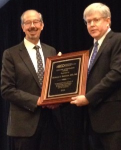 Dr. Morris Berman receives the ASCO Lifetime Achievement Award presented by Dr. Kevin L. Alexander, President of Marshall B. Ketchum University.