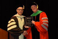 Dr. Arol Augsburger Presented with Dean’s Award for Meritorious Service at UMSL Graduation
